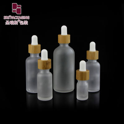 주문 Custom Frosted Essential Oil Empty Packaging 15ml 30ml 50ml 100ml Bamboo Dropper Bottle 온라인 제조